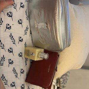 Clinique cream 6.7 new  not opend makeup bag Clinique and laura mercier bag